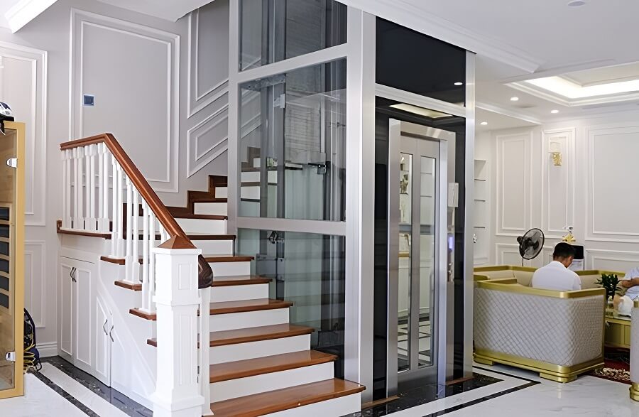 Mẫu cầu thang máy kính đơn giản, đẹp